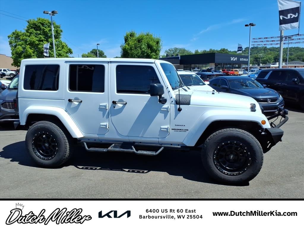 Used 2017 Jeep Wrangler Unlimited Sahara with VIN 1C4HJWEG9HL573028 for sale in Barboursville, WV
